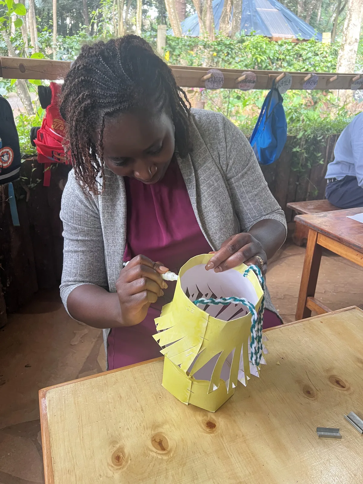 Liza making a lantern with her son